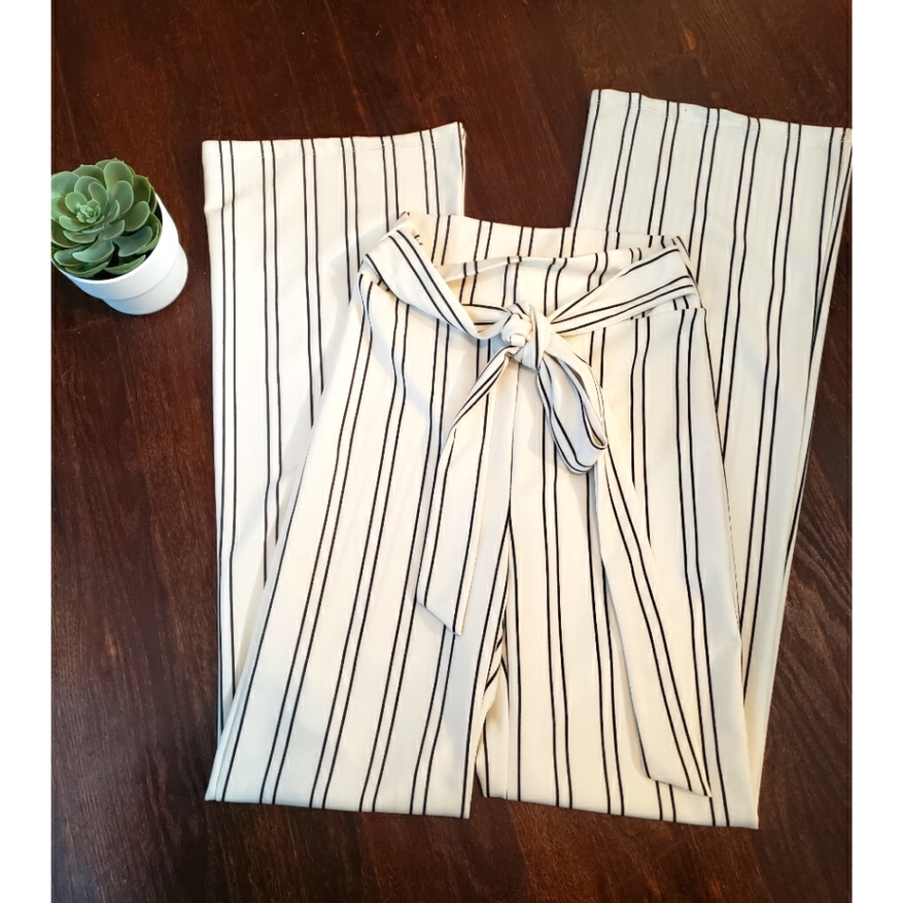 Brand new stretch fashion pants size small ivory